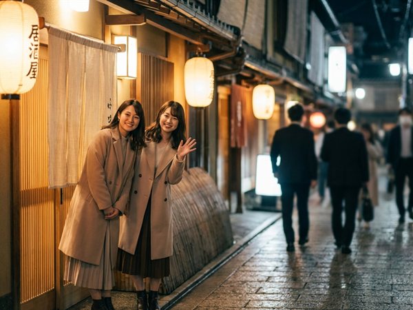 お店の前でお客様をお見送りする様子